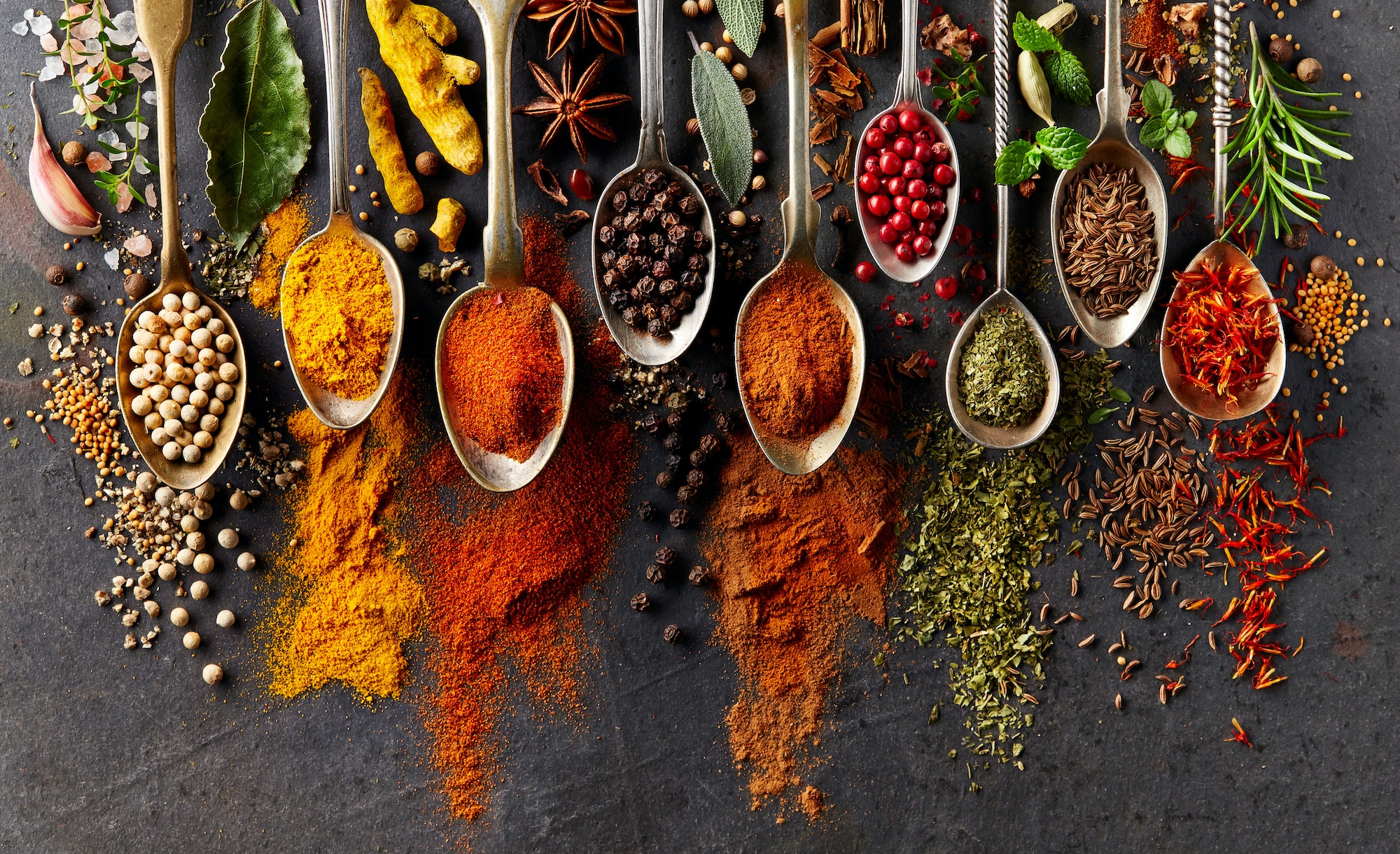 Spices on black background